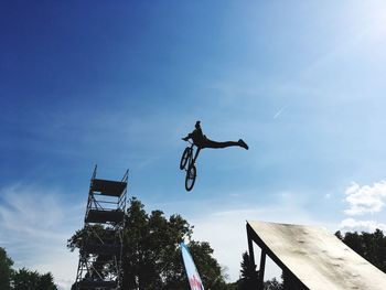 Low angle view of man jumping