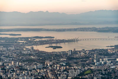 High angle view of city at sunset