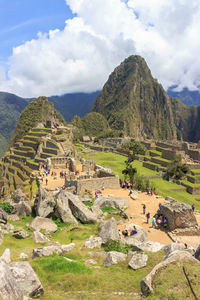 Scenic view of mountain against cloudy sky