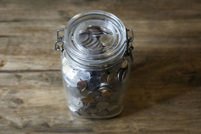 High angle view of glass jar on table