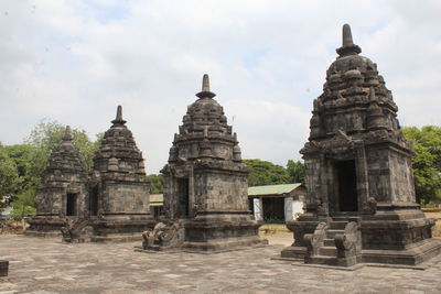 Old temple against building