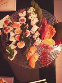 High angle view of sushi served on table