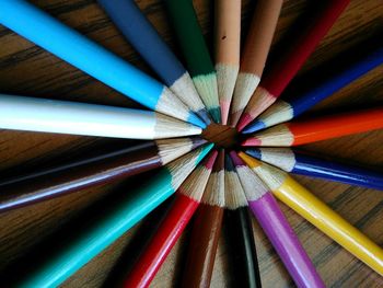 Full frame shot of colored pencils decorated on table