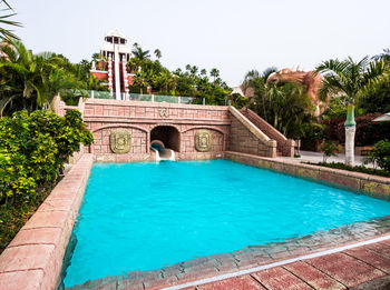 View of swimming pool against clear sky