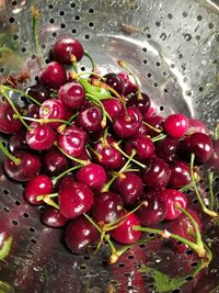 Close-up of wet cherries in water