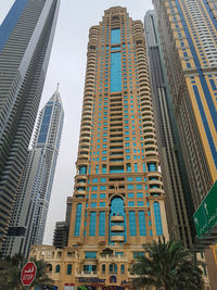 Low angle view of modern buildings against sky