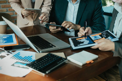 People using laptop on table