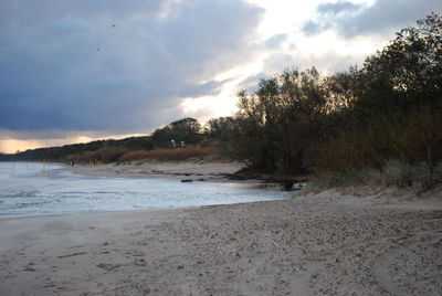 Scenic view of beach against sky