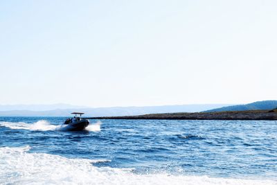 Scenic view of sea against clear sky