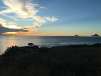 Scenic view of sea against sky during sunset