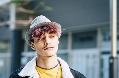 Portrait of young man outdoors