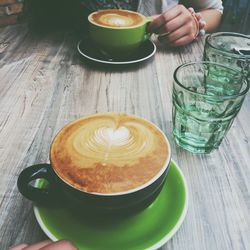 Close-up of coffee cup on table