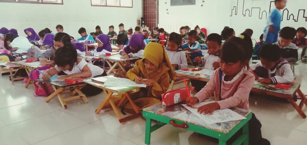 People sitting on table in cafe