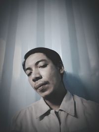 Portrait of young man looking away