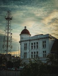 Low angle view of building against sky during sunset