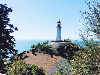 Lighthouse against blue sky