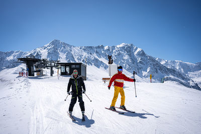 Father with 2 sons in ski trip in tirol, men's trip