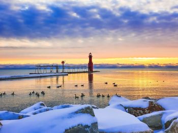 Scenic view of sea against sky during sunset