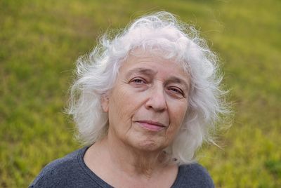 Portrait of a beautiful gray-haired seventy-year-old woman. person