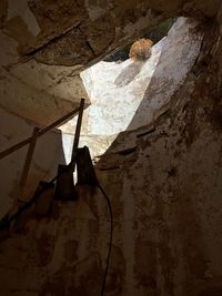 Low angle view of man working on floor