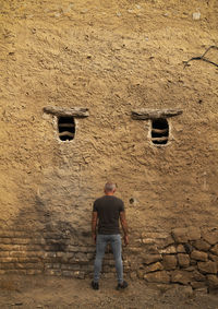 Adult man in film set in tabernas desert, almeria, spain