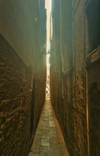 Narrow alley along buildings