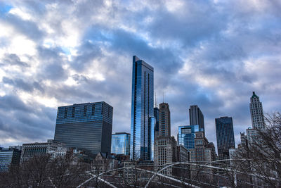 Modern buildings in city against sky