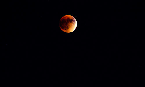 Low angle view of moon in sky