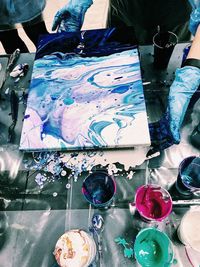 High angle view of painting on table