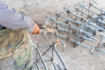 Rear view of man working at construction site