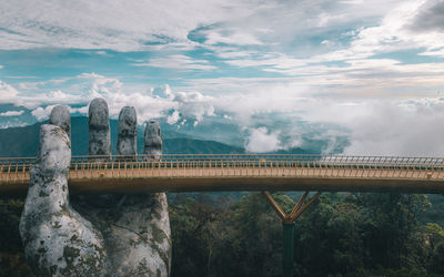 Arch bridge against sky