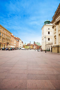 Buildings in city against sky