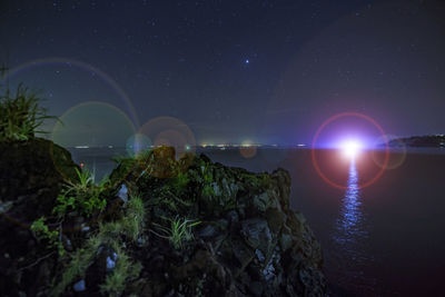 Scenic view of star field against sky at night