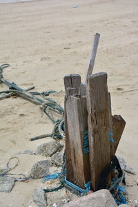 Close-up of wood on beach