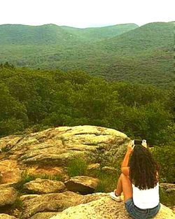 Man standing on rock formation