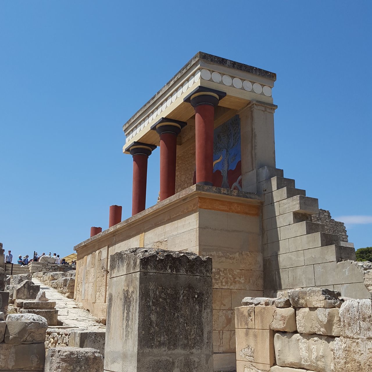 LOW ANGLE VIEW OF BUILT STRUCTURES AGAINST CLEAR BLUE SKY