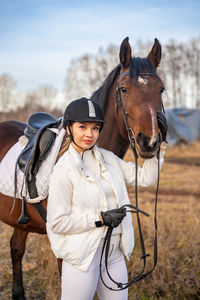 Horse standing on field