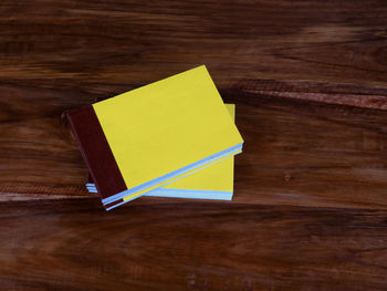 High angle view of paper board on table