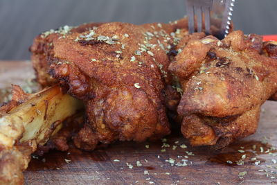 Close-up of meat on cutting board