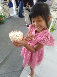 Girl holding ice cream