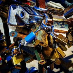 Close-up of padlocks on railing