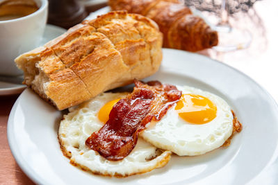 High angle view of breakfast in plate on table