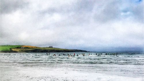 Scenic view of beach against sky