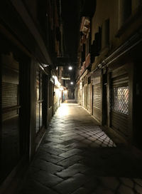 Empty walkway at night