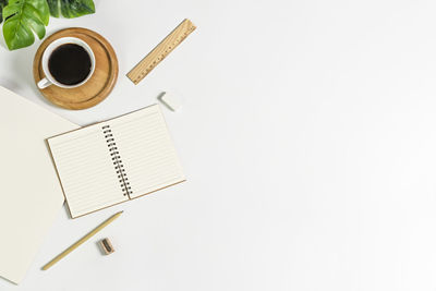 High angle view of coffee cup on table