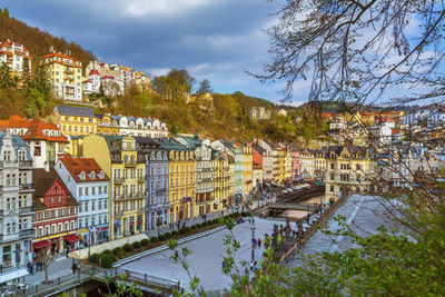 Historical houses along tepla river in city center of karlovy vary, czech republic