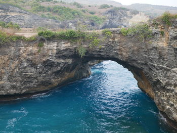 High angle view of water flowing through rocks