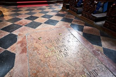 High angle view of text on tiled floor