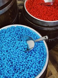 High angle view of candies in container
