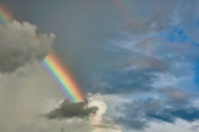 Low angle view of rainbow against sky